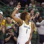 
              Baylor forward NaLyssa Smith celebrates during the second half of an NCAA college basketball game against Texas Tech in Waco, Texas, Sunday, March 6, 2022. (AP Photo/LM Otero)
            