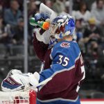 
              Colorado Avalanche goaltender Darcy Kuemper cools down in the second period of an NHL hockey game against the Calgary Flames, Sunday, March 13, 2022, in Denver. (AP Photo/David Zalubowski)
            