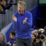 
              Golden State Warriors head coach Steve Kerr yells to his team during the first half of an NBA basketball game against the San Antonio Spurs in San Francisco, Sunday, March 20, 2022. (AP Photo/Jed Jacobsohn)
            