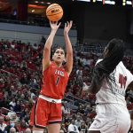 
              Gonzaga forward Anamaria Virjoghe (1) shoots over Louisville forward Olivia Cochran (44) during the first half of a women's NCAA tournament college basketball second-round game in Louisville, Ky., Sunday, March 20, 2022. (AP Photo/Timothy D. Easley)
            