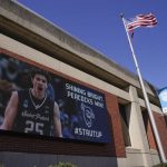 
              A billboard celebrates the men's basketball team at Saint Peter's University in Jersey City, N.J., Monday, March 21, 2022. (AP Photo/Seth Wenig)
            