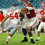 MIAMI GARDENS, FLORIDA - JANUARY 11: Evan Neal #73 of the Alabama Crimson Tide blocked by Tyler Friday #54 of the Ohio State Buckeyes during the third quarter of the College Football Playoff National Championship game at Hard Rock Stadium on January 11, 2021 in Miami Gardens, Florida. (Photo by Kevin C. Cox/Getty Images)