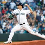 SEATTLE, WASHINGTON - APRIL 15: Marco Gonzales #7 of the Seattle Mariners throws the opening pitch during the first inning against the Houston Astros at T-Mobile Park on April 15, 2022 in Seattle, Washington. All players are wearing the number 42 in honor of Jackie Robinson Day. (Photo by Steph Chambers/Getty Images)