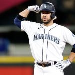 SEATTLE, WASHINGTON - APRIL 23: Eugenio Suarez #28 of the Seattle Mariners reacts after his RBI double against the Kansas City Royals during the sixth inning at T-Mobile Park on April 23, 2022 in Seattle, Washington. (Photo by Steph Chambers/Getty Images)