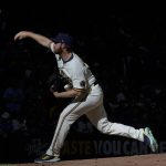 
              Milwaukee Brewers relief pitcher Brandon Woodruff throws during the second inning of a baseball game against the St. Louis Cardinals Thursday, April 14, 2022, in Milwaukee. (AP Photo/Morry Gash)
            
