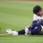 
              Houston Astros' Jose Altuve reacts after legging out an infield single in the bottom of the eighth inning against the Los Angeles Angels, Monday, April 18, 2022, in Houston. (Kevin M. Cox/The Galveston County Daily News via AP)
            