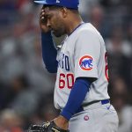 
              Chicago Cubs relief pitcher Mychal Givens paces on the mound as he waits to be removed during the eighth inning of the team's baseball game against the Atlanta Braves on Wednesday, April 27, 2022, in Atlanta. (AP Photo/John Bazemore)
            