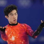 
              FILE - Nathan Chen competes in the men's free skate program during the figure skating event at the 2022 Winter Olympics, Thursday, Feb. 10, 2022, in Beijing. Nathan Chen withdrew from the world championships on Wednesday, March 16, because of what he called a “nagging injury” that he’s been dealing with after winning at the Beijing Games. (AP Photo/Natacha Pisarenko, File)
            
