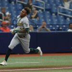 
              Oakland Athletics' Cristian Pache runs home to score against the Tampa Bay Rays during the second inning of a baseball game Thursday, April, 14, 2022, in St. Petersburg, Fla. (AP Photo/Scott Audette)
            