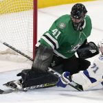 
              Dallas Stars goaltender Scott Wedgewood (41) defends the goal against Tampa Bay Lightning center Anthony Cirelli (71) during the second period of an NHL hockey game in Dallas, Tuesday, April 12, 2022. (AP Photo/LM Otero)
            