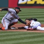 
              San Francisco Giants second basemen Thairo Estrada tags out Cleveland Guardians' Jose Ramirez in the first inning of a baseball game, Sunday, April 17, 2022, in Cleveland. Ramirez tried to stretch a single into a double. (AP Photo/David Dermer)
            