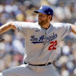 
              Los Angeles Dodgers' Clayton Kershaw pitches against the San Diego Padres during the first inning of a baseball game Sunday, April 24, 2022, in San Diego. (AP Photo/Mike McGinnis)
            
