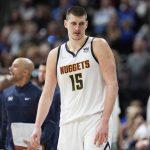 
              Denver Nuggets center Nikola Jokic looks on as time runs out in the second half of an NBA basketball game against the Minnesota Timberwolves, Friday, April 1, 2022, in Denver. (AP Photo/David Zalubowski)
            