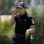 
              Hinako Shibuno of Japan tips her hat to the gallery on the fourth hole during the final round of the LPGA Chevron Championship golf tournament Sunday, April 3, 2022, in Rancho Mirage, Calif. (AP Photo/Marcio Jose Sanchez)
            