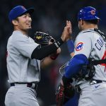 
              Chicago Cubs Seiya Suzuki (27) and Willson Contreras (40) celebrate after the Cubs defeated the Atlanta Braves 6-3 in a baseball game Wednesday, April 27, 2022, in Atlanta. (AP Photo/John Bazemore)
            