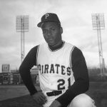 
              FILE - Roberto Clemente of the Pittsburgh Pirates is seen in Tampa, Fla., March 3, 1963. Winners of the Roberto Clemente Award will wear his No. 21 on back of their caps for the rest of their major league careers. Major League Baseball made the announcement Thursday, April 7, 2022, saying it was a “special tribute to his enduring legacy.” (AP Photo/Preston Stroup, File)
            