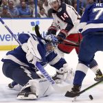 
              Tampa Bay Lightning goaltender Andrei Vasilevskiy (88) makes a save on a shot from Columbus Blue Jackets center Gustav Nyquist (14) during the first period of an NHL hockey game Tuesday, April 26, 2022, in Tampa, Fla. (AP Photo/Jason Behnken)
            