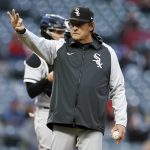 
              Chicago White Sox manager Tony La Russa signals to the dugout during a pitching change in the sixth inning of the second game of the baseball team's doubleheader against the Cleveland Guardians, Wednesday, April 20, 2022, in Cleveland. (AP Photo/Ron Schwane)
            