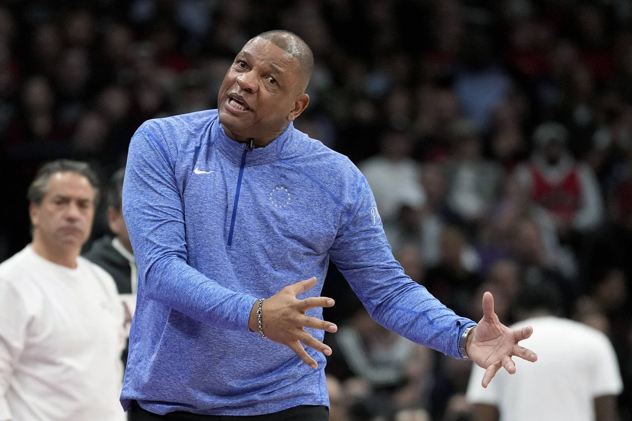 Philadelphia 76ers coach Doc Rivers argues with officials during the second half of Game 6 of the t...