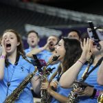 
              The North Carolina band cheers during practice for the men's Final Four NCAA college basketball tournament, Friday, April 1, 2022, in New Orleans. (AP Photo/Gerald Herbert)
            