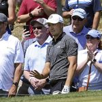 
              Jordan Spieth, center, reacts to his shot on the second day of play at the Valero Texas Open golf tournament in San Antonio, Friday, April 1, 2022. (Jerry Lara/The San Antonio Express-News via AP)
            