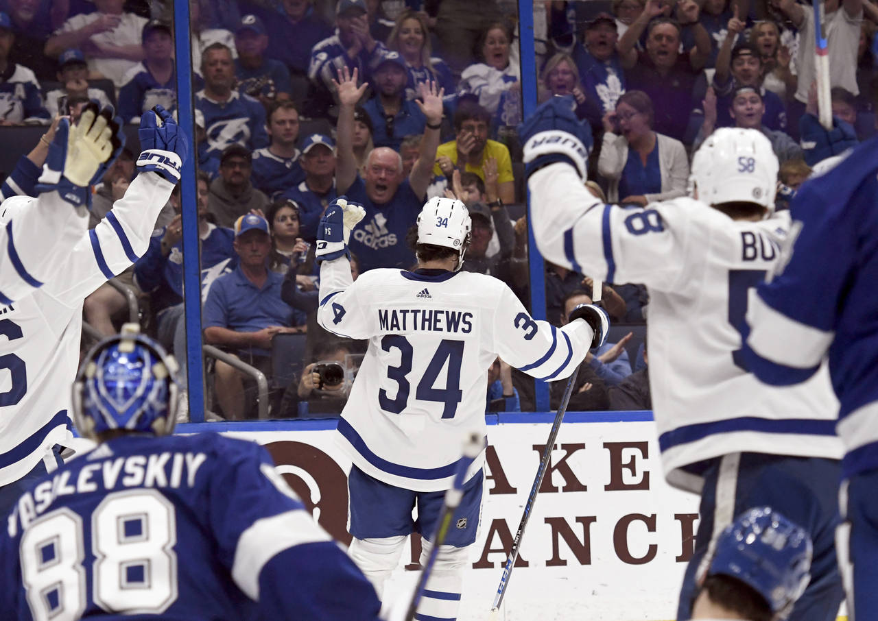 Toronto Maple Leafs center Auston Matthews (34) celebrates his third period goal during an NHL hock...