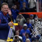 
              Kansas head coach Bill Self cuts down the net after a college basketball game in the Elite 8 round of the NCAA tournament against Miami Sunday, March 27, 2022, in Chicago. Kansas won 76-50 to advance to the Final Four. (AP Photo/Charles Rex Arbogast)
            