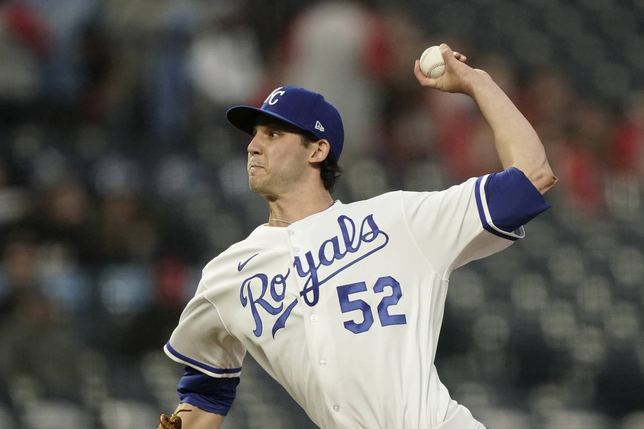 Kansas City Royals starting pitcher Daniel Lynch throws during the first inning of a baseball game ...