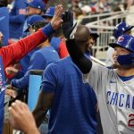 
              Chicago Cubs' Seiya Suzuki (27) is congratulated n the dugout after driving in a run with a double, and later scoring, during the third inning of the team's baseball game against the Atlanta Braves on Wednesday, April 27, 2022, in Atlanta. (AP Photo/John Bazemore)
            