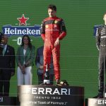 
              Ferrari driver Charles Leclerc, centre, of Monaco stands on the podium after winning the Australian Formula One Grand Prix in Melbourne, Australia, Sunday, April 10, 2022. Red Bull driver Sergio Perez, left, of Mexico was second and Mercedes driver George Russell of Britain finished third. (AP Photo/Asanka Brendon Ratnayake)
            