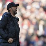 
              Liverpool's manager Jurgen Klopp celebrates after the English Premier League soccer match between Liverpool and Everton at Anfield stadium in Liverpool, England, Sunday, April 24, 2022. (AP Photo/Jon Super)
            