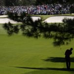 
              Tiger Woods hits on the seventh fairway during the final round at the Masters golf tournament on Sunday, April 10, 2022, in Augusta, Ga. (AP Photo/Jae C. Hong)
            