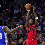 
              Toronto Raptors' OG Anunoby, right, goes up for a shot against Philadelphia 76ers' Paul Reed during the first half of Game 5 in an NBA basketball first-round playoff series, Monday, April 25, 2022, in Philadelphia. (AP Photo/Matt Slocum)
            