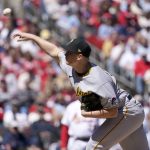 
              Pittsburgh Pirates starting pitcher Mitch Keller throws during the first inning of a baseball game against the St. Louis Cardinals Saturday, April 9, 2022, in St. Louis. (AP Photo/Jeff Roberson)
            