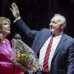 
              NHL hockey legend Guy Lafleur waves to fans as his wife Lise looks on during a ceremony to honor him, Thursday, October 28, 2021, at the Videotron Centre in Quebec City. Montreal Canadiens legend Guy Lafleur has died at age 70. (Jacques Boissinot/The Canadian Press via AP)
            