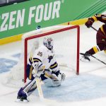 
              Minnesota's Matthew Knies (89) scores on Minnesota State's Dryden McKay (29) during the first period of an NCAA men's Frozen Four college hockey semifinal Thursday, April 7, 2022, in Boston. (AP Photo/Michael Dwyer)
            