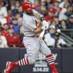 
              St. Louis Cardinals' Albert Pujols (5) hits a three-run home run against the Milwaukee Brewers during the third inning of a baseball game, Sunday, April 17, 2022, in Milwaukee. (AP Photo/Jeffrey Phelps)
            