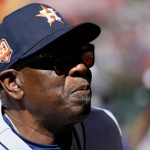 
              Houston Astros manager Dusty Baker pauses in the dugout during the sixth inning of a baseball game against the Arizona Diamondbacks, Wednesday, April 13, 2022, in Phoenix. (AP Photo/Ross D. Franklin)
            