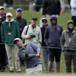 
              Scottie Scheffler chips to the third green during the third round at the Masters golf tournament on Saturday, April 9, 2022, in Augusta, Ga. (AP Photo/Robert F. Bukaty)
            