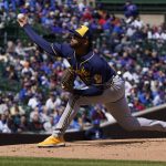 
              Milwaukee Brewers starting pitcher Freddy Peralta (51) throws the ball against the Chicago Cubs during the first inning of a baseball game, Sunday, April, 10, 2022, in Chicago. (AP Photo/David Banks)
            