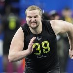 
              FILE - Northern Iowa offensive lineman Trevor Penning runs a drill during the NFL football scouting combine, Friday, March 4, 2022, in Indianapolis. Offensive lineman Trevor Penning of Northern Iowa and receiver Christian Watson of North Dakota State, two FCS schools, could be first-rounders in the NFL Draft. (AP Photo/Darron Cummings, File)
            