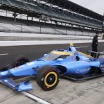 
              Jimmie Johnson pulls out of the pits during IndyCar auto racing testing at Indianapolis Motor Speedway, Wednesday, April 20, 2022, in Indianapolis. (AP Photo/Darron Cummings)
            