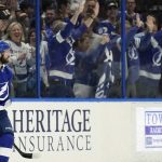 
              Tampa Bay Lightning right wing Nikita Kucherov (86) celebrates in front of the fans after scoring against the Anaheim Ducks during the third period of an NHL hockey game Thursday, April 14, 2022, in Tampa, Fla. (AP Photo/Chris O'Meara)
            