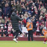 
              Liverpool's manager Jurgen Klopp celebrates after winning the English Premier League soccer match between Liverpool and Watford at Anfield stadium in Liverpool, England, Saturday, April 2, 2022. (AP Photo/Jon Super)
            
