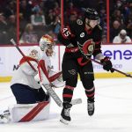 
              Ottawa Senators left wing Parker Kelly (45) tries to tip the puck in front of Florida Panthers goaltender Spencer Knight (30) during the second period of an NHL hockey game Thursday, April 28, 2022, in Ottawa, Ontario. (Justin Tang/The Canadian Press via AP)
            