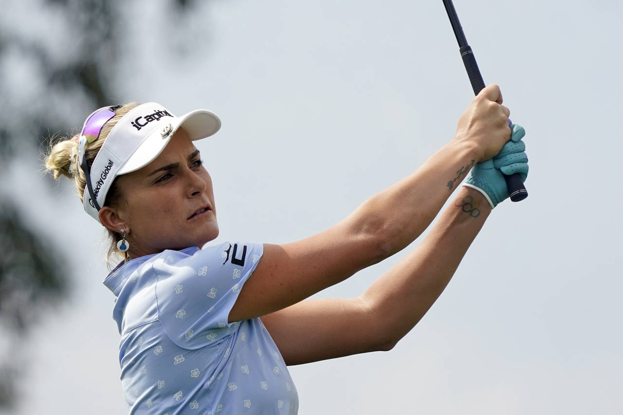 Lexi Thompson hits from the fourth tee during the final round of the LPGA Chevron Championship golf...