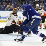 
              Tampa Bay Lightning center Brayden Point (21) misses a pass behind Anaheim Ducks goaltender Anthony Stolarz (41) during the second period of an NHL hockey game Thursday, April 14, 2022, in Tampa, Fla. (AP Photo/Chris O'Meara)
            