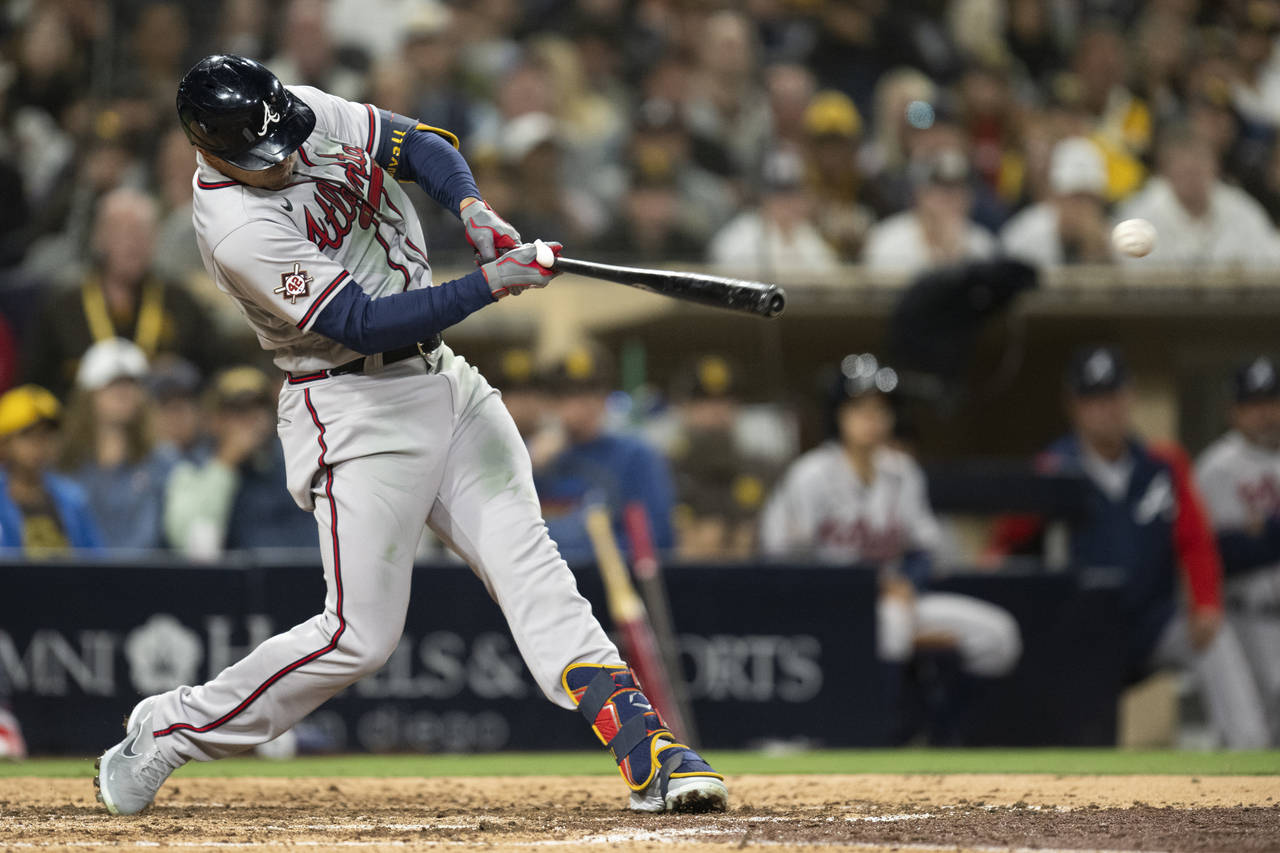 Atlanta Braves' Adam Duvall hits an RBI double during the eighth inning of the team's baseball game...