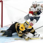 
              Boston Bruins goaltender Linus Ullmark (35) scrambles after the puck as Florida Panthers right wing Patric Hornqvist (70) looks for the rebound during the third period of an NHL hockey game, Tuesday, April 26, 2022, in Boston. (AP Photo/Charles Krupa)
            