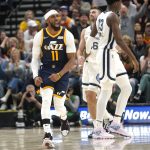 
              Utah Jazz guard Mike Conley (11) reacts during the second half of the team's NBA basketball game against the Memphis Grizzlies on Tuesday, April 5, 2022, in Salt Lake City. (AP Photo/Rick Bowmer)
            